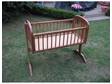 £22 - SWINGING WOODEN crib cot ideal